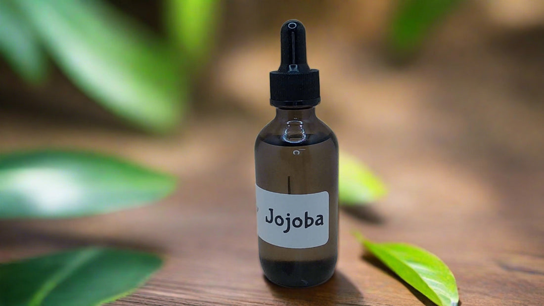 a bottle of jojoba sitting on top of a wooden table