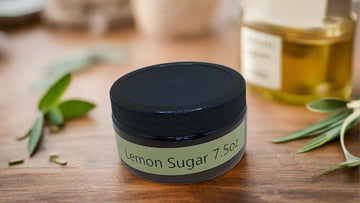 a jar of lemon sugar on a table