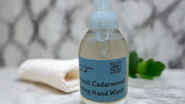 a bottle of hand wash sitting on a counter