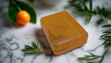 a soap bar sitting on top of a marble counter