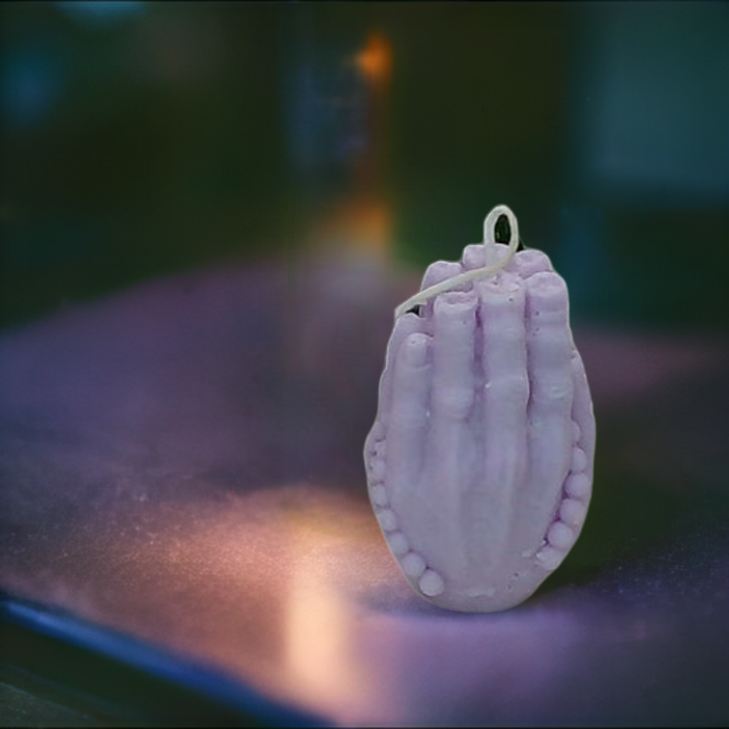 a close up of a purple object on a table