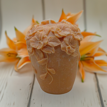 a cup filled with food sitting on top of a white table