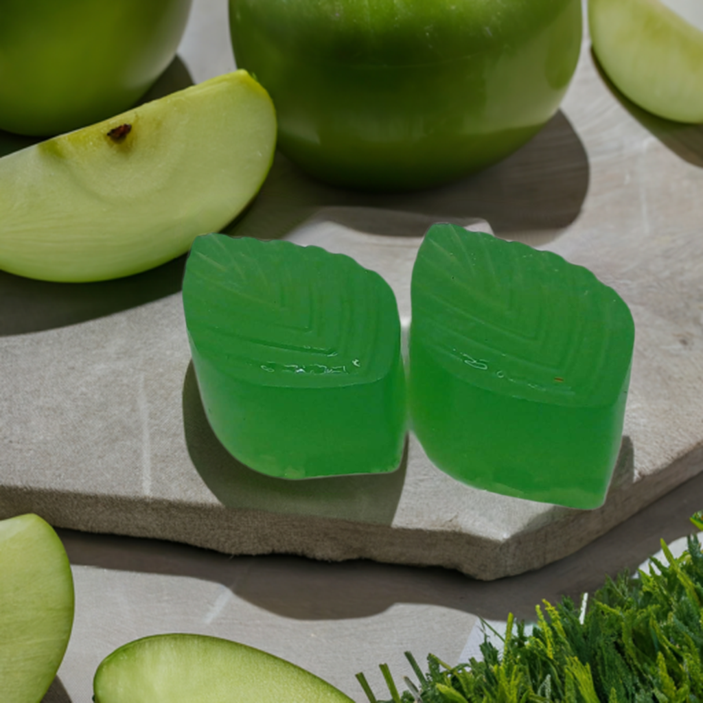 a couple of pieces of fruit sitting on top of a cutting board