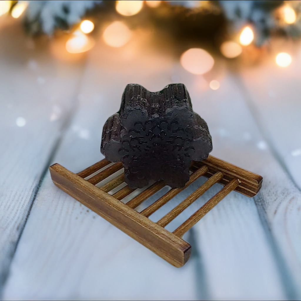 a wooden sled with a rock on top of it