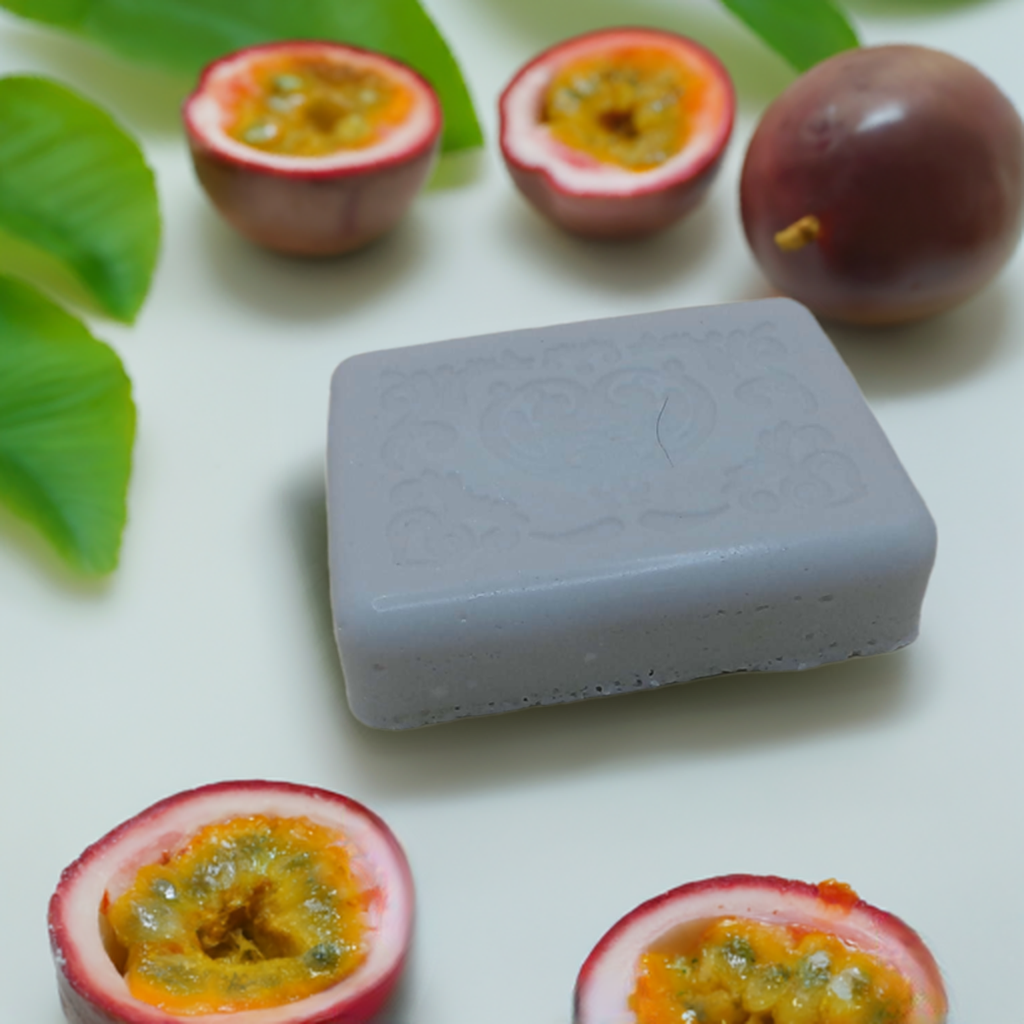 a soap bar sitting on top of a table next to fruit