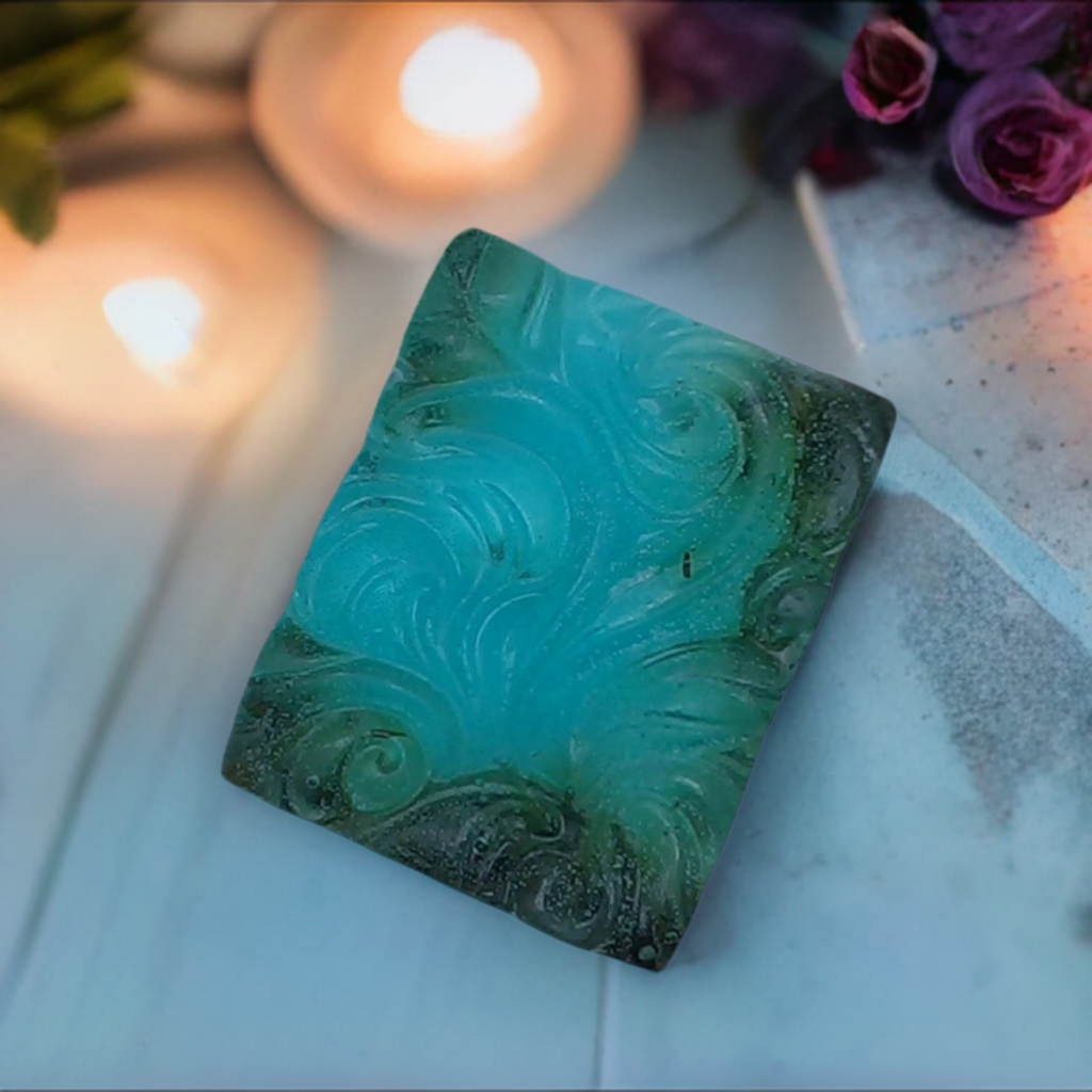 a close up of a square glass object on a table