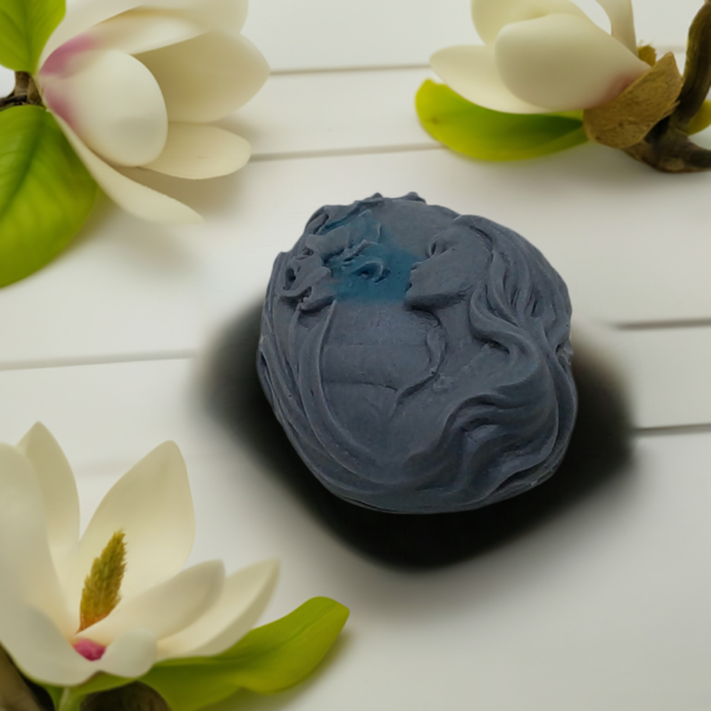 a blue soap sitting on top of a white table