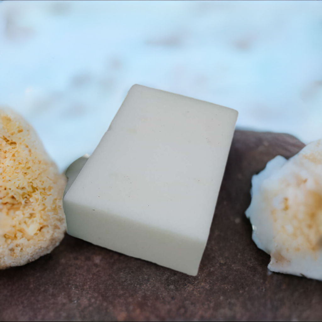 a couple of pieces of soap sitting on top of a table