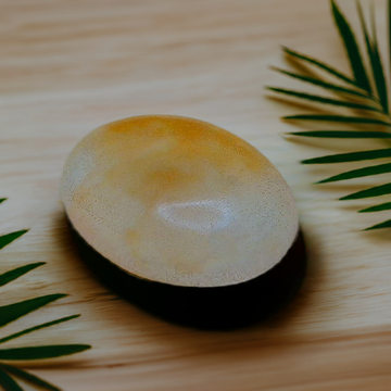 a round object sitting on top of a wooden table