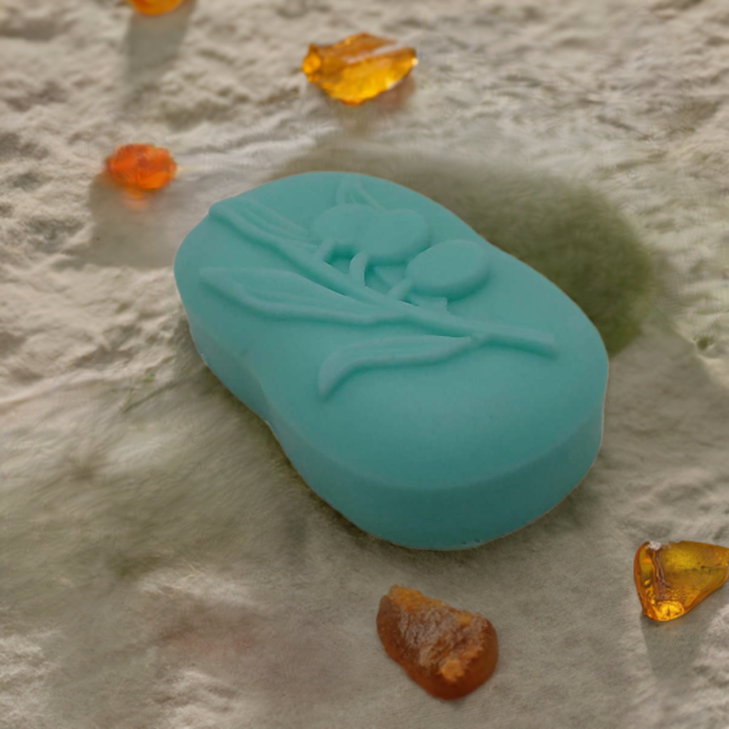 a blue soap sitting on top of a sandy beach