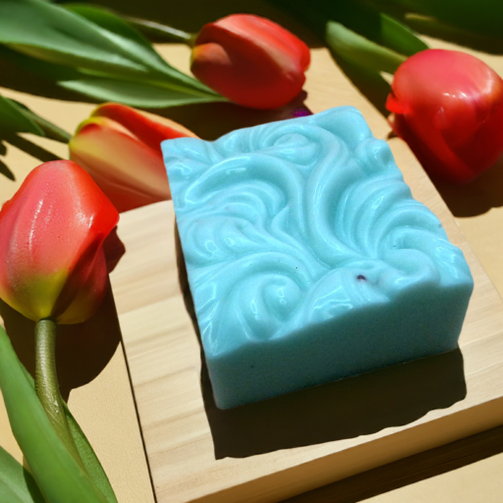 a soap bar sitting on top of a wooden block