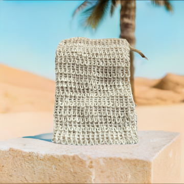 a piece of cloth sitting on top of a stone block