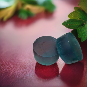 a couple of soaps sitting on top of a table