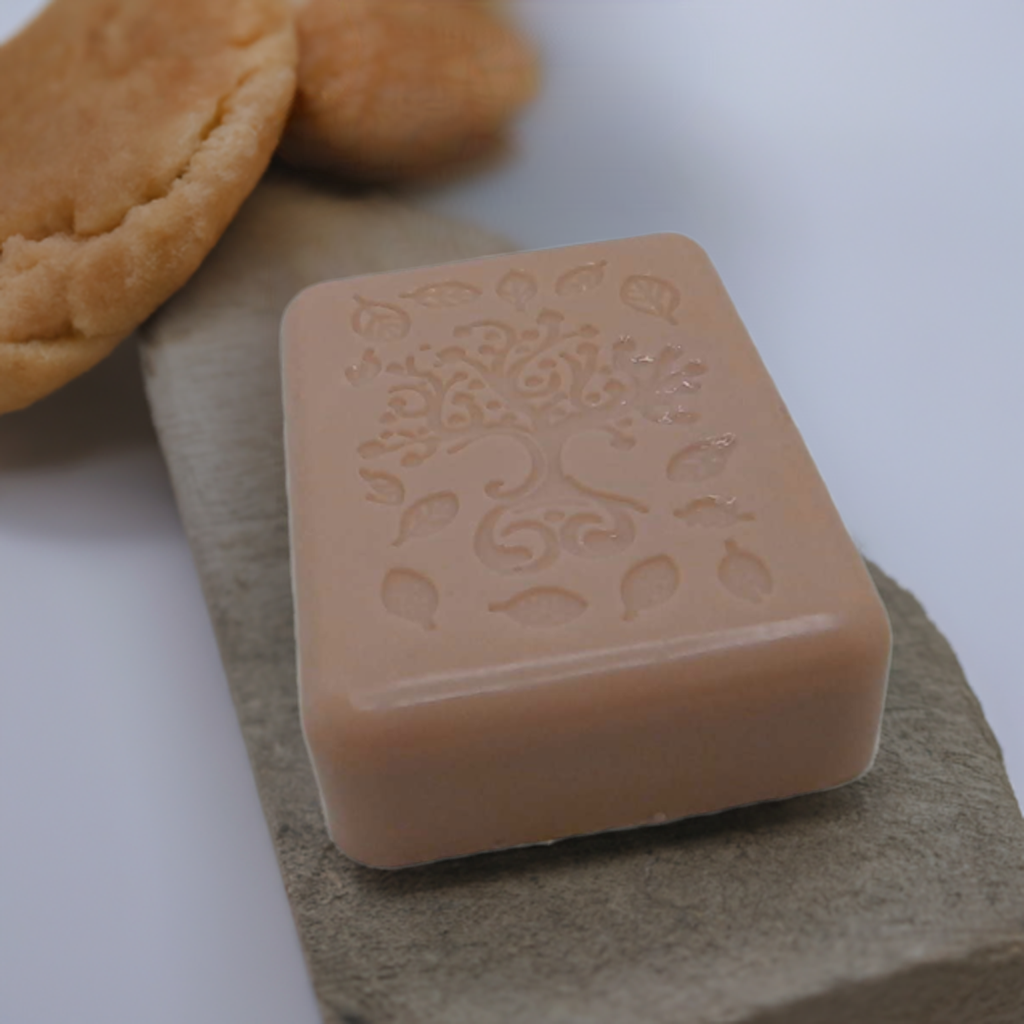 a close up of a cookie and a soap bar