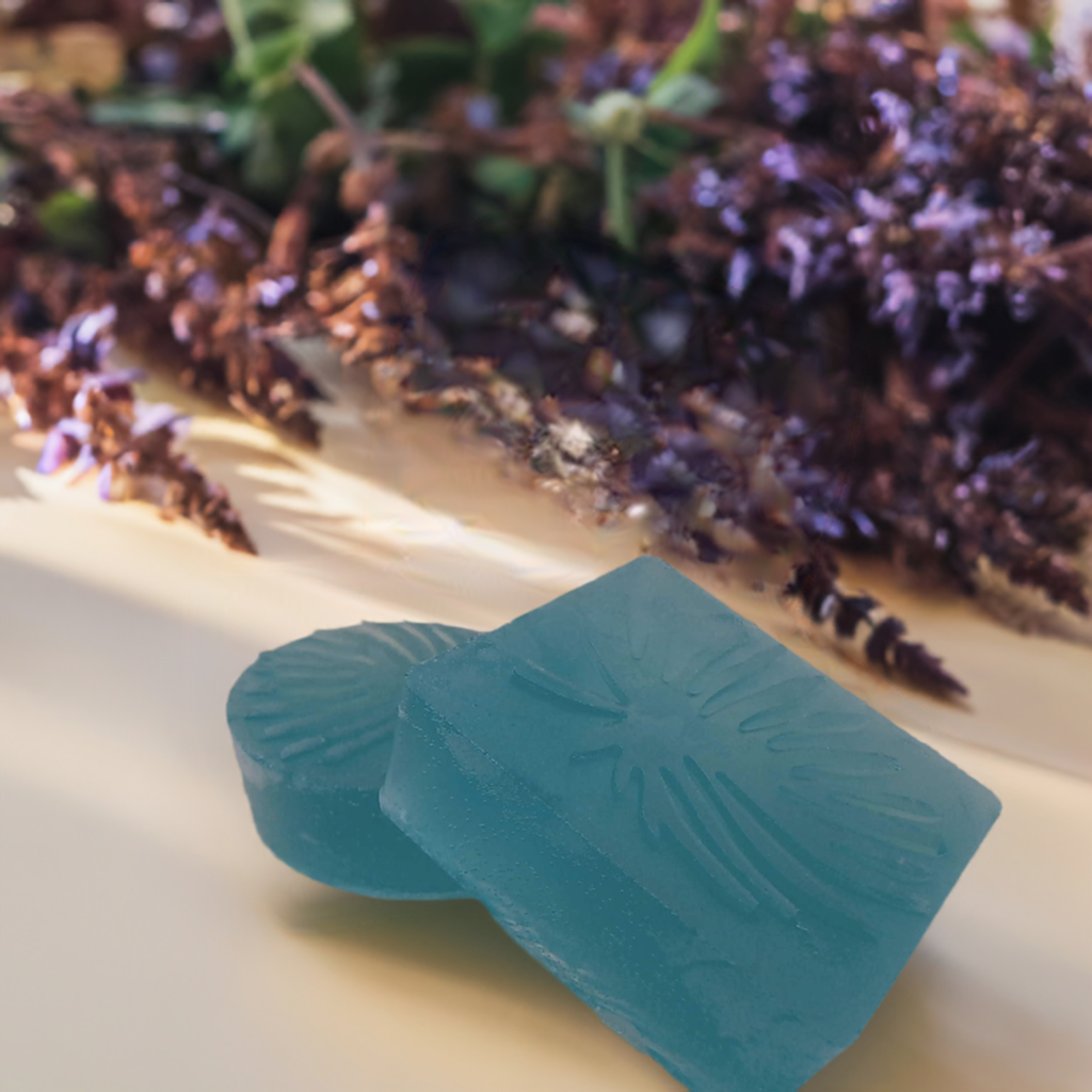 a piece of blue soap sitting on top of a table