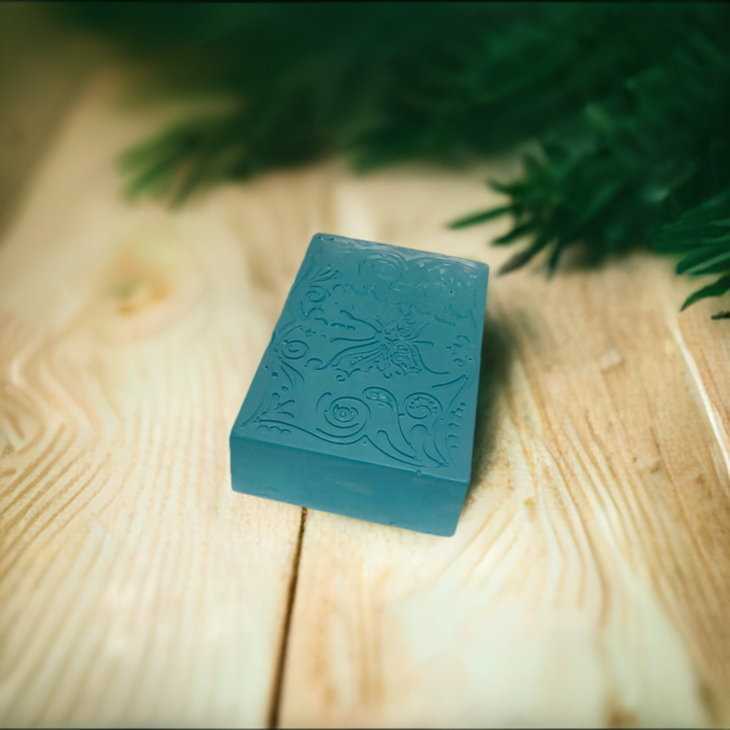 a blue soap sitting on top of a wooden table