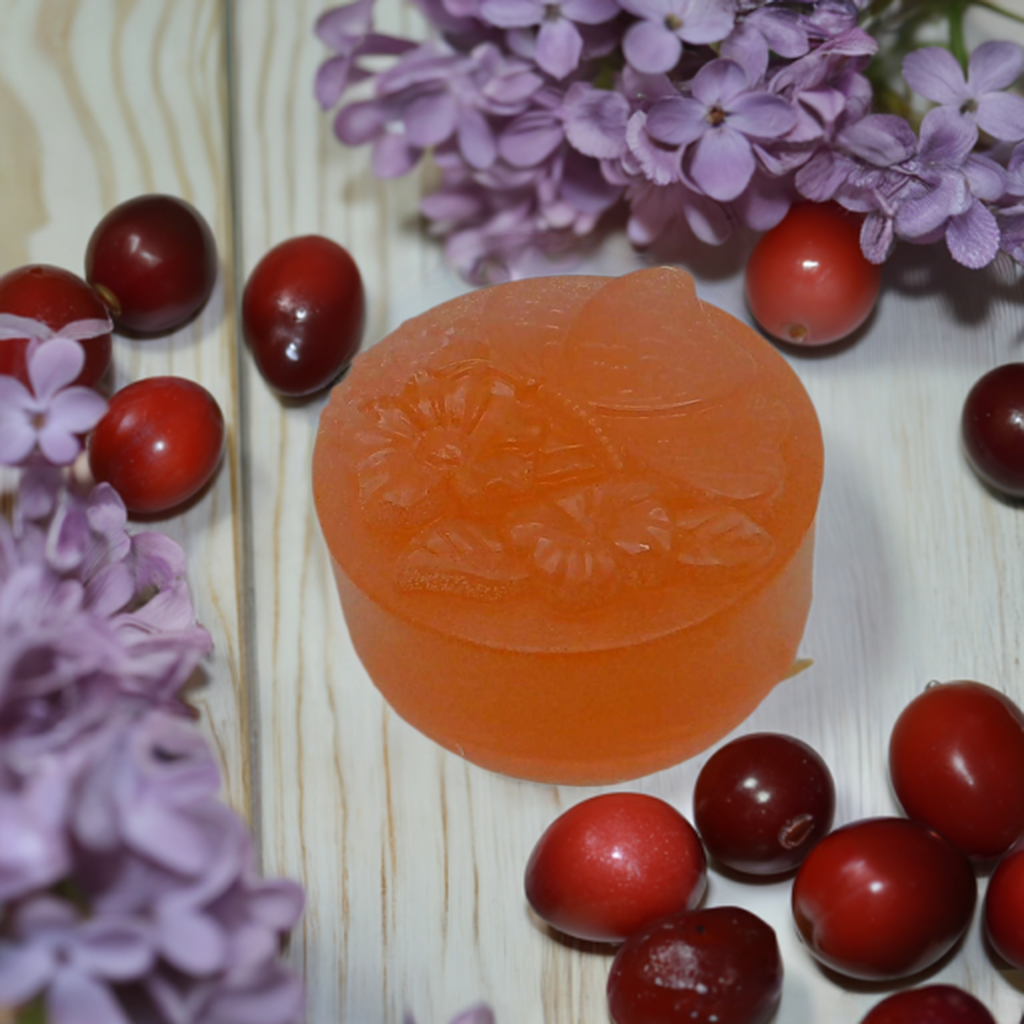 a close up of a soap surrounded by flowers