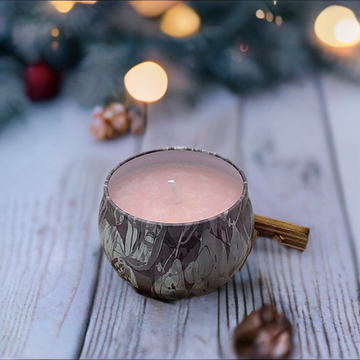 a candle sitting on top of a wooden table