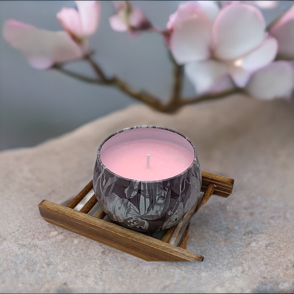 a candle sitting on top of a wooden stand