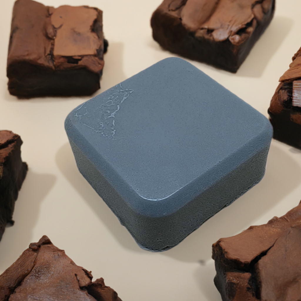 a organic soap sitting on top of a white table