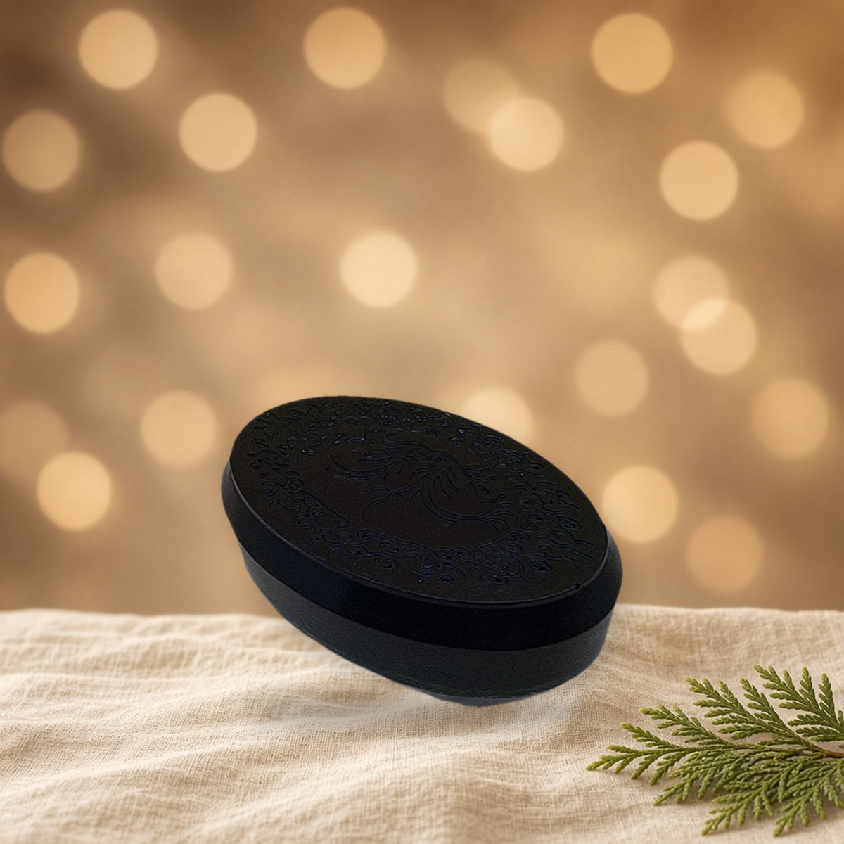 Green Tea & Eucalyptus Glycerin Soap handmade soap on linen with warm holiday bokeh lights