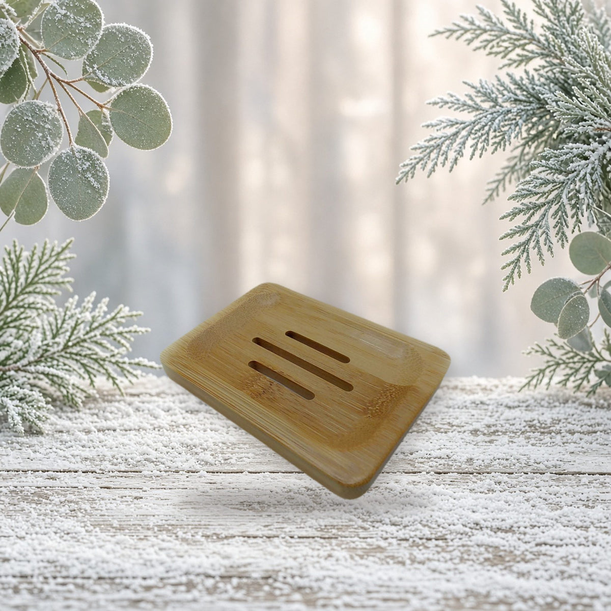 Rectangle Bamboo Dish handmade soap on a frosted white wood table with winter greenery